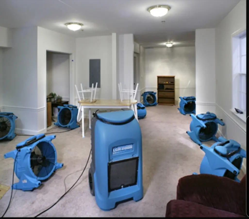 Air movers and dehumidifier setup for Water Damage Restoration in River Falls